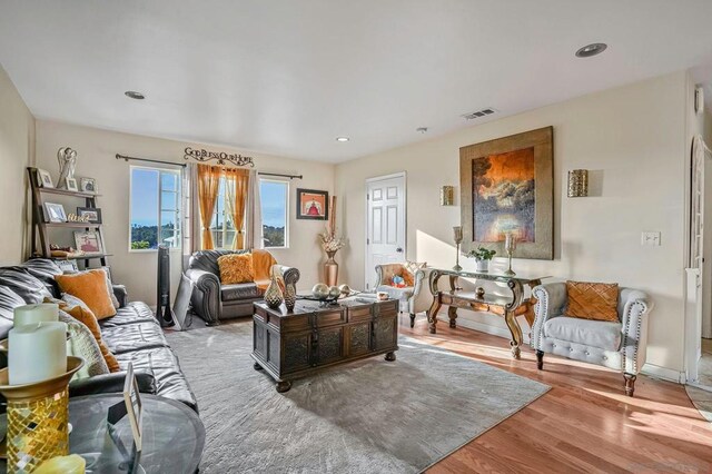 living room with light hardwood / wood-style floors