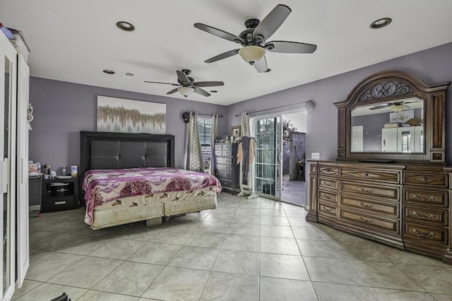 bedroom featuring ceiling fan and light tile patterned floors