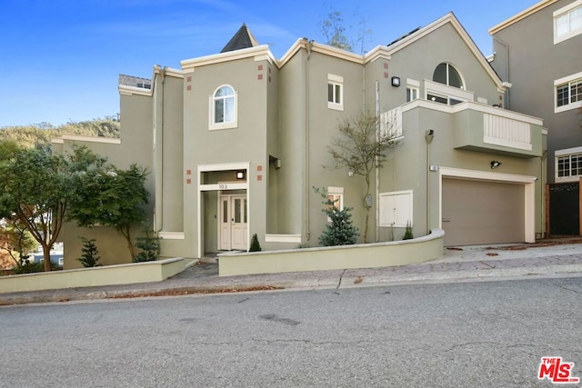 view of front of home featuring a garage