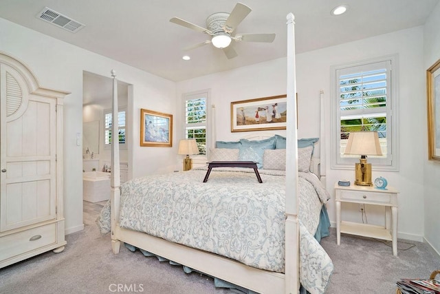 carpeted bedroom featuring ceiling fan and connected bathroom