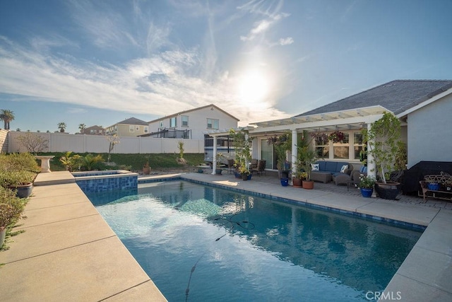 view of swimming pool featuring a patio area, an in ground hot tub, and outdoor lounge area