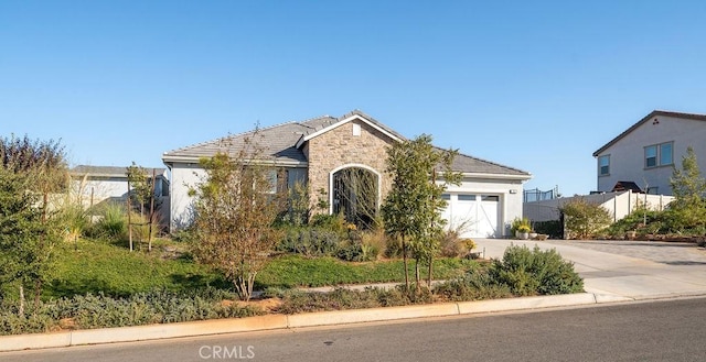 view of front of home with a garage