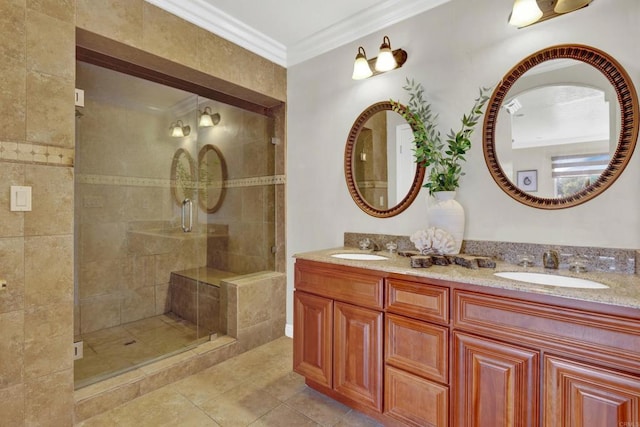 bathroom with vanity, tile patterned floors, walk in shower, and crown molding