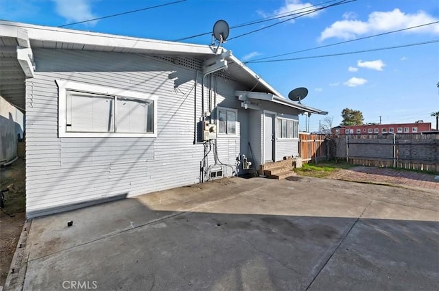 rear view of property featuring a patio