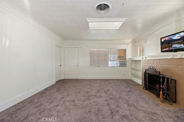 unfurnished living room with a fireplace, carpet floors, and ornamental molding