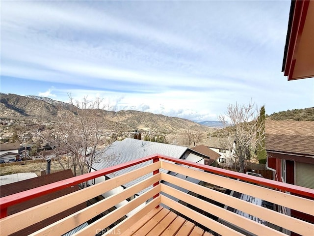 balcony featuring a mountain view