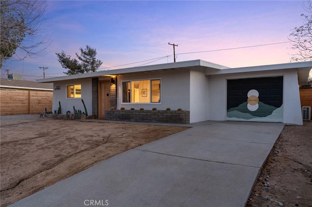 view of front of house with a garage