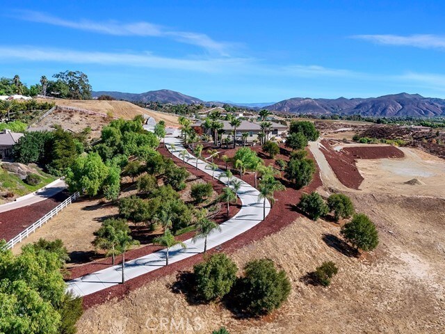 surrounding community with a mountain view