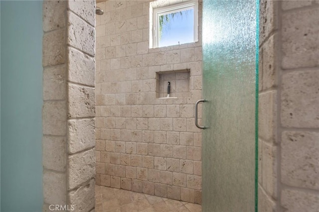 bathroom featuring walk in shower