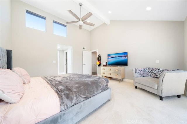 carpeted bedroom with beamed ceiling, high vaulted ceiling, and ceiling fan