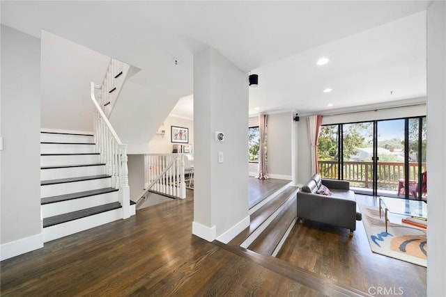 living room featuring dark hardwood / wood-style flooring