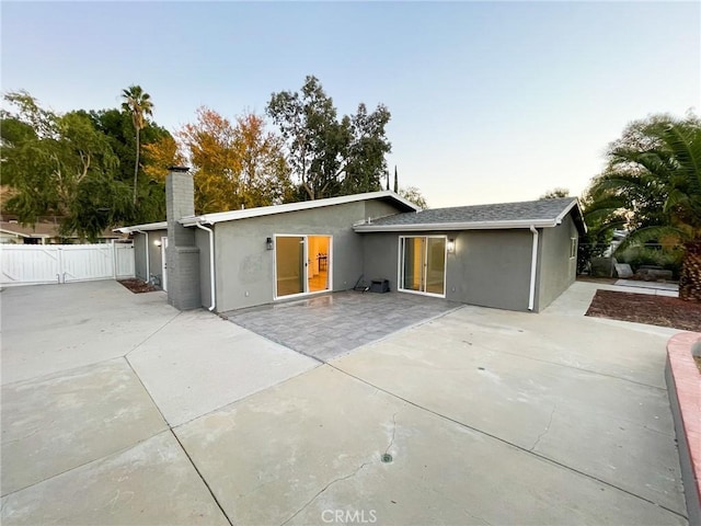 rear view of house with a patio area