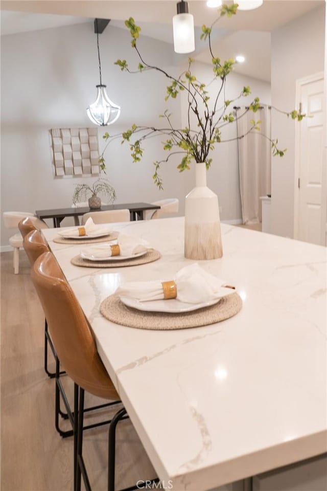 dining room with light wood-type flooring