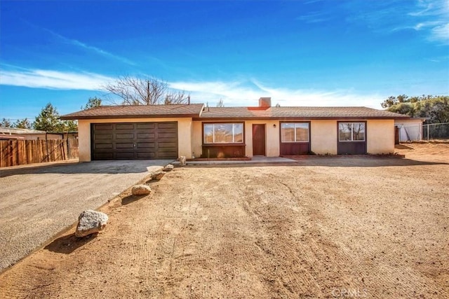 ranch-style house with a garage