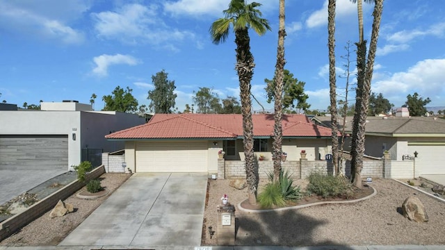 ranch-style house featuring a garage