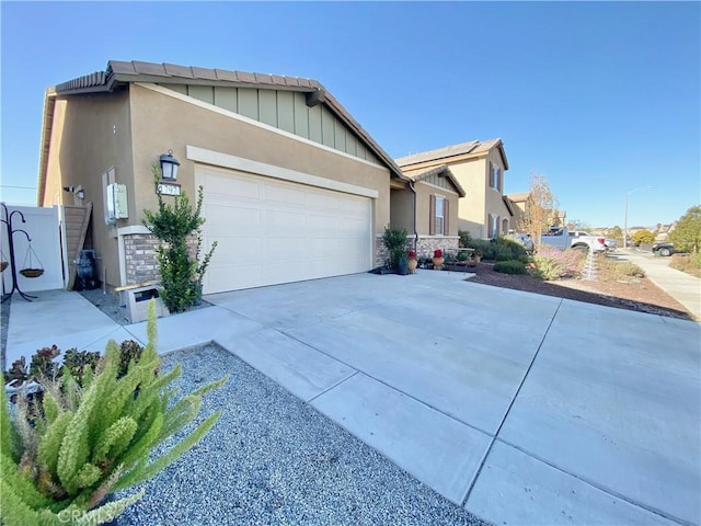 view of front of home with a garage