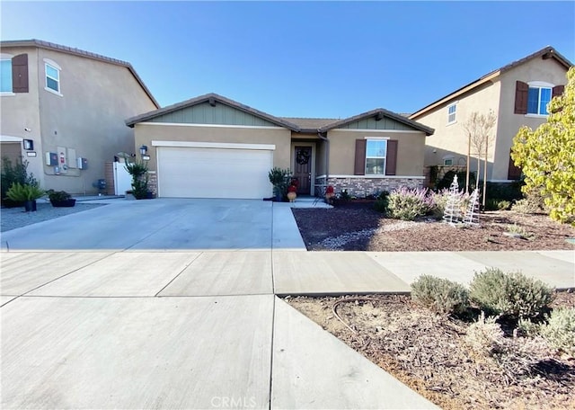 ranch-style home featuring a garage