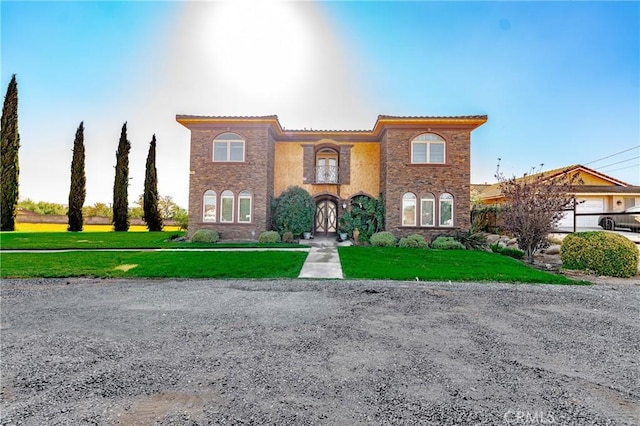 view of front of house with a front lawn