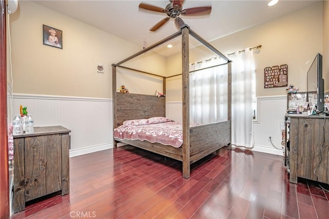 bedroom featuring ceiling fan and dark hardwood / wood-style flooring