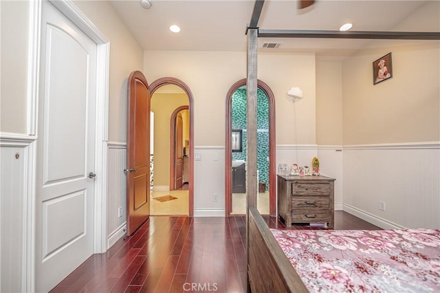 bedroom featuring dark wood-type flooring