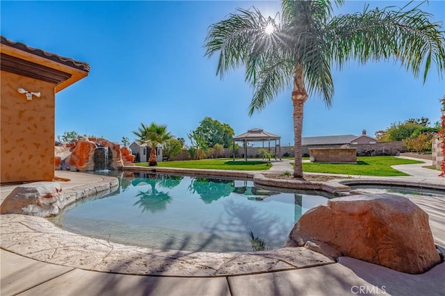 view of pool featuring a gazebo and a yard