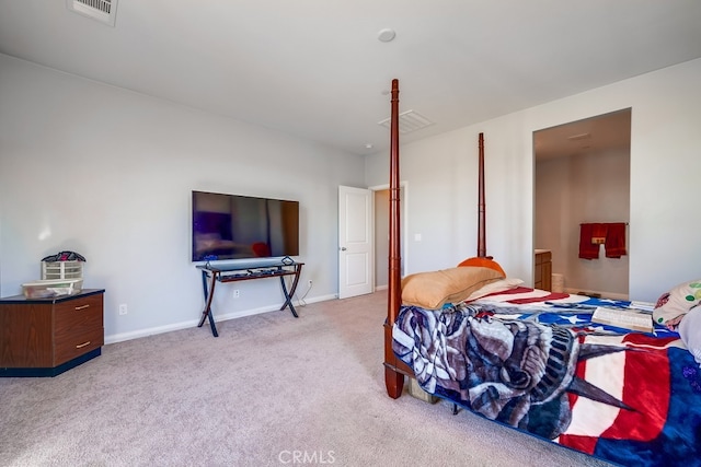 bedroom with light carpet