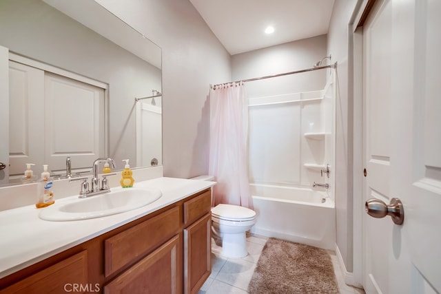 full bathroom with tile patterned flooring, vanity, shower / bath combo, and toilet