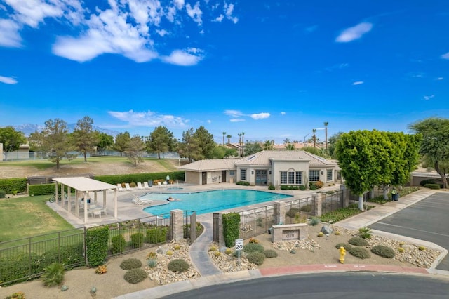 view of swimming pool with a patio