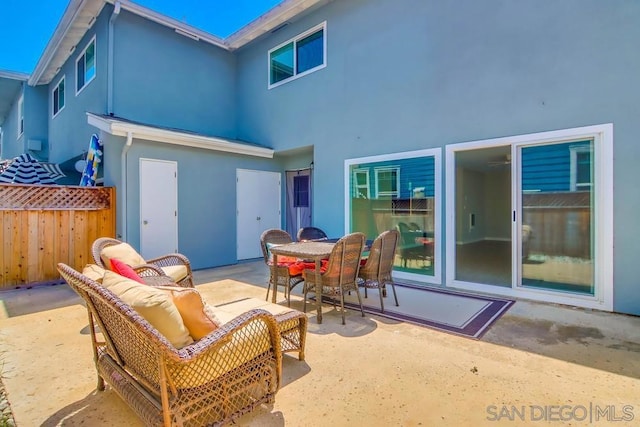 back of house with a patio and an outdoor hangout area