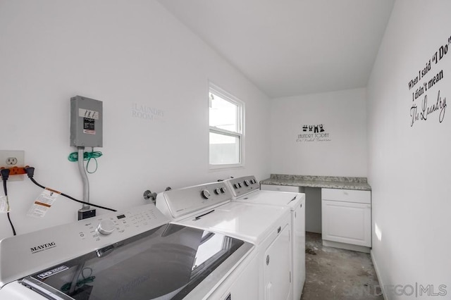 washroom with cabinets and independent washer and dryer