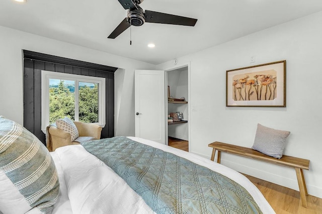 bedroom featuring hardwood / wood-style floors and ceiling fan