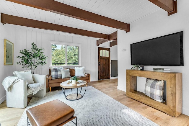 living room with wood ceiling, beamed ceiling, and light hardwood / wood-style floors