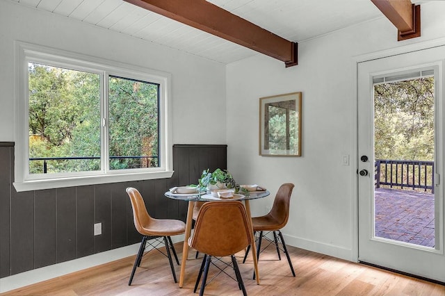 dining area featuring a healthy amount of sunlight and light wood-type flooring