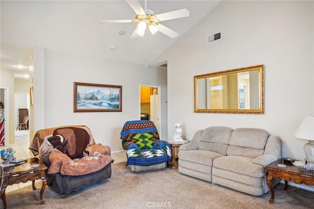 living room featuring carpet flooring, ceiling fan, and high vaulted ceiling