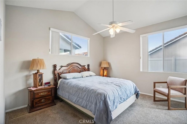 carpeted bedroom featuring vaulted ceiling and ceiling fan