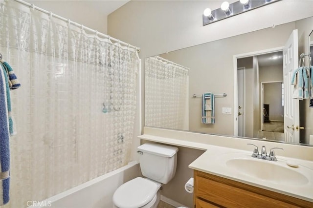 full bathroom with shower / bath combo with shower curtain, vanity, and toilet