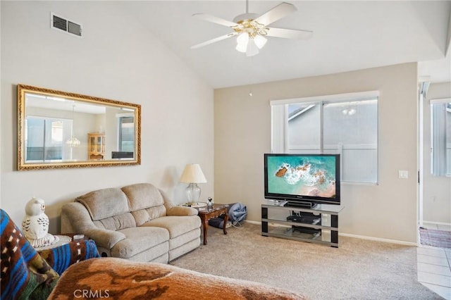 living room featuring ceiling fan, carpet, and lofted ceiling