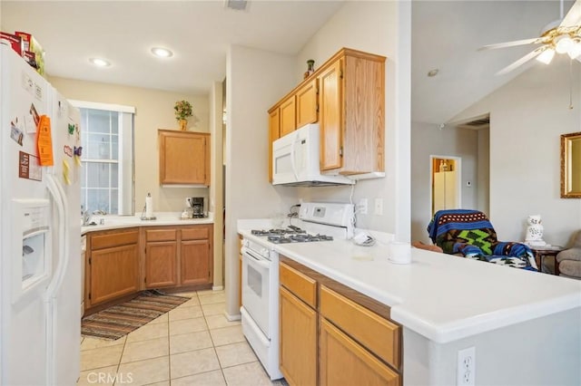 kitchen with ceiling fan, light tile patterned flooring, and white appliances