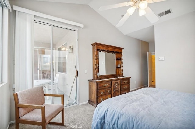 bedroom with ceiling fan, lofted ceiling, and light carpet