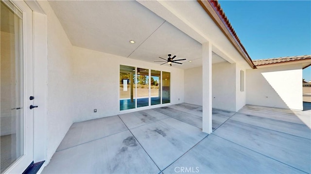 view of patio / terrace featuring ceiling fan