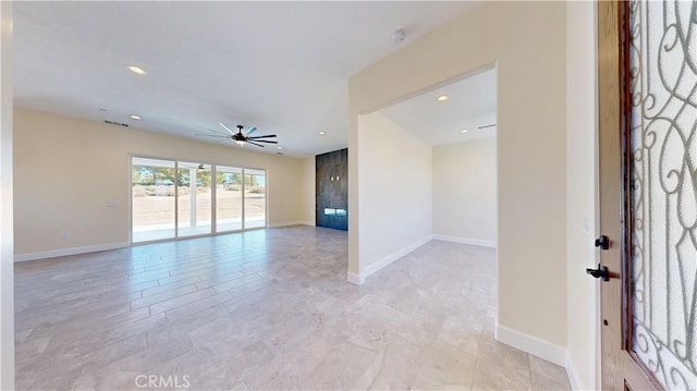 spare room featuring ceiling fan