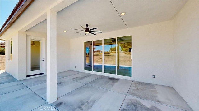 view of patio / terrace featuring ceiling fan