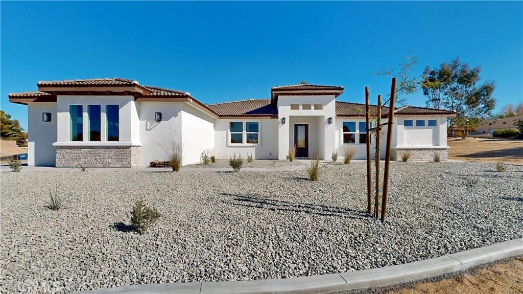 14285 Riverside Dr, Apple Valley, CA 92307 - view of front facade featuring a garage