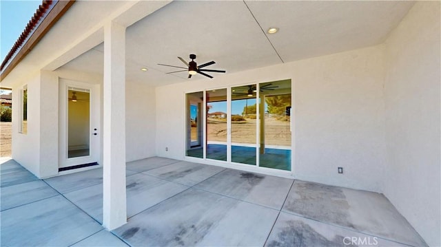 view of patio / terrace featuring ceiling fan