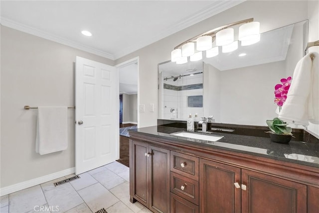 bathroom with vanity, tile patterned floors, a shower with shower door, and crown molding