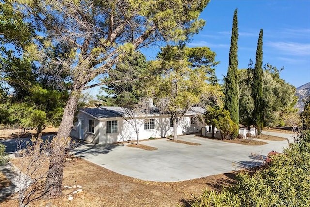 view of front of house with a patio area