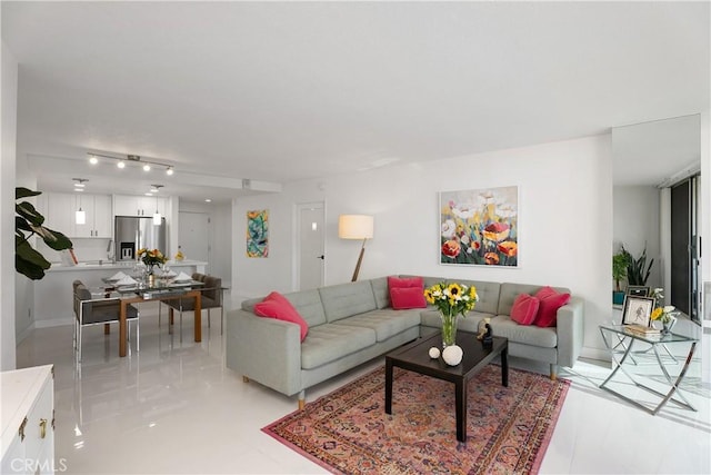 living room with light tile patterned floors