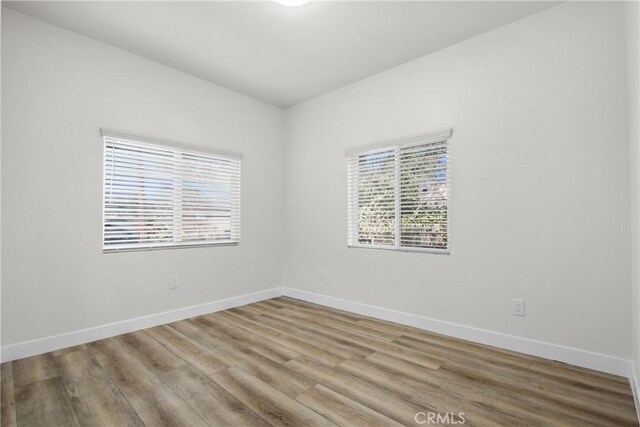 empty room with light wood-type flooring