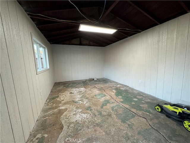 empty room with vaulted ceiling