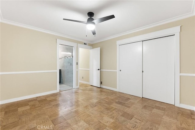 unfurnished bedroom featuring ceiling fan, crown molding, light parquet flooring, and a closet